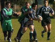 30 May 2007; Argentina's Marcos Ayerza is tackled by Rimas Alverez, second from left, and Martin Durand, left, during squad training. Argentina Rugby training, Pilar, Argentina. Picture credit: Pat Murphy / SPORTSFILE
