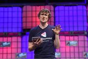 6 November 2014; Paddy Cosgrave, Founder and CEO, Web Summit, introduces Bono, Musician, Elevation Partners, to the centre stage during Day 3 of the 2014 Web Summit in the RDS, Dublin, Ireland. Picture credit: Stephen McCarthy / SPORTSFILE / Web Summit