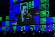 6 November 2014; Bono's image is projected on the big screen as attendees record his every move, on the centre stage during Day 3 of the 2014 Web Summit in the RDS, Dublin, Ireland. Picture credit: Ray McManus / SPORTSFILE / Web Summit