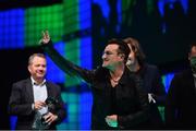 6 November 2014; Bono, Musician, Elevation Partners, leads the centre stage after discussing Movies & Music in the 21st Century during Day 3 of the 2014 Web Summit in the RDS, Dublin, Ireland. Picture credit: Ramsey Cardy / SPORTSFILE / Web Summit