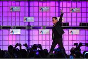 6 November 2014; Bono, Musician, Elevation Partners, waves to the crowd at the centre stage during Day 3 of the 2014 Web Summit in the RDS, Dublin, Ireland. Picture credit: Ramsey Cardy / SPORTSFILE / Web Summit