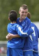20 May 2007; Crumlin United's Shane Byrne celebrates with a team-mate after the final whistle. U13 Final for FAI, Shelbourne v Crumlin United, Home Farm FC, Whitehall, Dublin. Picture credit: Ray Lohan / SPORTSFILE  *** Local Caption ***