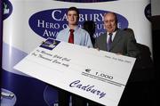 31 May 2007; The Cork U21 footballer Fintan Goold is presented with his Cadbury Hero of the Future Award by Michael Smith, Marketing Director, Cadbury Ireland at the Cadbury U21 Football Hero Awards, Westin Hotel, Dublin. Picture credit: Ray McManus / SPORTSFILE