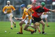 3 June 2007; Simon McCrory, Antrim, in action against FIntan Conway, Down. Guinness Ulster Senior Hurling Championship Final, Antrim v Down, Casement Park, Belfast, Co Antrim. Picture credit: Oliver McVeigh / SPORTSFILE