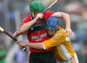 3 June 2007; Simon McCrory, Antrim, in action against Fintan Conway, Down. Guinness Ulster Senior Hurling Championship Final, Antrim v Down, Casement Park, Belfast, Co Antrim. Picture credit: Oliver McVeigh / SPORTSFILE