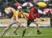 3 June 2007; Brendan McGourty, Down, in action against Malachy Molloy, Antrim. Guinness Ulster Senior Hurling Championship Final, Antrim v Down, Casement Park, Belfast, Co Antrim. Picture credit: Oliver McVeigh / SPORTSFILE