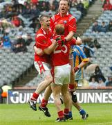 3 June 2007; Louth players, left to right, Mark Brennan, JP Rooney, and Mark Stanfield celebrate at the end of the game. Bank of Ireland Leinster Senior Football Championship 2nd Replay, Louth v Wicklow, Croke Park, Dublin. Picture credit: David Maher / SPORTSFILE