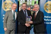 8 November 2014; Referee Con Reynolds, from Down, is presented with his retiring referees' award by Pat McEnaney, Chairman of National Referee Committee, left, and Frank Burke, Vice- President of Gaa. 2014 National Referees' Awards Banquet, Croke Park, Dublin. Picture credit: Barry Cregg / SPORTSFILE