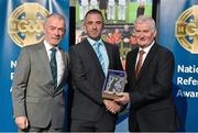 8 November 2014; Referee Jason O’Mahony, from Limerick, is presented with his retiring referees' medal by Pat McEnaney, Chairman of National Referee Committee, left, and Frank Burke, Vice- President of Gaa. 2014 National Referees' Awards Banquet, Croke Park, Dublin. Picture credit: Barry Cregg / SPORTSFILE