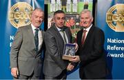 8 November 2014; Referee Garret Duffy, from Antrim, is presented with his retiring referees' award by Pat McEnaney, Chairman of National Referee Committee, left, and Frank Burke, Vice- President of Gaa. 2014 National Referees' Awards Banquet, Croke Park, Dublin. Picture credit: Barry Cregg / SPORTSFILE
