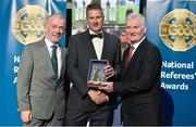 8 November 2014; Referee Sean Whelan, from Wexford, is presented with his retiring referees' award by Pat McEnaney, Chairman of National Referee Committee, left, and Frank Burke, Vice- President of Gaa. 2014 National Referees' Awards Banquet, Croke Park, Dublin. Picture credit: Barry Cregg / SPORTSFILE