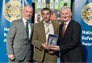 8 November 2014; Referee Robert O'Donnell, from Donegal, is presented with his retiring referees' award by Pat McEnaney, Chairman of National Referee Committee, left, and Frank Burke, Vice- President of Gaa. 2014 National Referees' Awards Banquet, Croke Park, Dublin. Picture credit: Barry Cregg / SPORTSFILE
