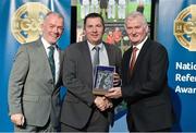 8 November 2014; Referee Ray Matthews, from Antrim, is presented with his retiring referees' award by Pat McEnaney, Chairman of National Referee Committee, left, and Frank Burke, Vice- President of Gaa. 2014 National Referees' Awards Banquet, Croke Park, Dublin. Picture credit: Barry Cregg / SPORTSFILE