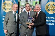 8 November 2014; Referee Paul Kneel, from Louth, is presented with his retiring referees' award by Pat McEnaney, Chairman of National Referee Committee, left, and Frank Burke, Vice- President of Gaa. 2014 National Referees' Awards Banquet, Croke Park, Dublin. Picture credit: Barry Cregg / SPORTSFILE