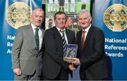 8 November 2014; Referee Michael Meade, from Limerick, is presented with his retiring referees' award by Pat McEnaney, Chairman of National Referee Committee, left, and Frank Burke, Vice- President of Gaa. 2014 National Referees' Awards Banquet, Croke Park, Dublin. Picture credit: Barry Cregg / SPORTSFILE