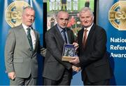 8 November 2014; Referee Martin Higgins, from Fermanagh, is presented with his retiring referees' award by Pat McEnaney, Chairman of National Referee Committee, left, and Frank Burke, Vice- President of Gaa. 2014 National Referees' Awards Banquet, Croke Park, Dublin. Picture credit: Barry Cregg / SPORTSFILE