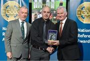 8 November 2014; Referee John Sexton, from Cork, is presented with his retiring referees' award by Pat McEnaney, Chairman of National Referee Committee, left, and Frank Burke, Vice- President of Gaa. 2014 National Referees' Awards Banquet, Croke Park, Dublin. Picture credit: Barry Cregg / SPORTSFILE
