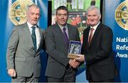 8 November 2014; Referee Joe Curley, from Meath, is presented with his retiring referees' award by Pat McEnaney, Chairman of National Referee Committee, left, and Frank Burke, Vice- President of Gaa. 2014 National Referees' Awards Banquet, Croke Park, Dublin. Picture credit: Barry Cregg / SPORTSFILE