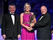 8 November 2014; Angela Walsh, Cork, is presented with her TG4 Ladies Football All-Star Award by Pat Quill, President of the Ladies Gaelic Football Association, in the company of Pól O Gallchóir, left, Ceannsaí, TG4. TG4 Ladies Football All-Star Awards 2014, Citywest Hotel, Saggart, Co. Dublin. Picture credit: Brendan Moran / SPORTSFILE