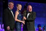8 November 2014; Vera Foley, Cork, is presented with her TG4 Ladies Football All-Star Award by Pat Quill, President of the Ladies Gaelic Football Association, in the company of Pól O Gallchóir, left, Ceannsaí, TG4. TG4 Ladies Football All-Star Awards 2014, Citywest Hotel, Saggart, Co. Dublin. Picture credit: Ray McManus / SPORTSFILE