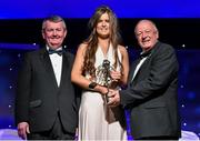 8 November 2014; Roisin Egan, Offaly, is presented with her TG4 Ladies Football Leinster Young Player of the Year Award by Pat Quill, President of the Ladies Gaelic Football Association, in the company of Pól O Gallchóir, left, Ceannsaí, TG4. TG4 Ladies Football All-Star Awards 2014, Citywest Hotel, Saggart, Co. Dublin. Picture credit: Brendan Moran / SPORTSFILE