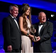 8 November 2014; Roisin Egan, Offaly, is presented with her TG4 Ladies Football Leinster Young Player of the Year Award by Pat Quill, President of the Ladies Gaelic Football Association, in the company of Pól O Gallchóir, left, Ceannsaí, TG4. TG4 Ladies Football All-Star Awards 2014, Citywest Hotel, Saggart, Co. Dublin. Picture credit: Ray McManus / SPORTSFILE