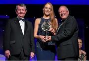 8 November 2014; Aishling Moloney, Tipperary, is presented with her TG4 Ladies Football Munster Young Player of the Year Award by Pat Quill, President of the Ladies Gaelic Football Association, in the company of Pól O Gallchóir, left, Ceannsaí, TG4. TG4 Ladies Football All-Star Awards 2014, Citywest Hotel, Saggart, Co. Dublin. Picture credit: Brendan Moran / SPORTSFILE
