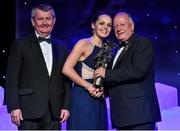 8 November 2014; Ciamh Dollard, Laois, is presented with her TG4 Ladies Football All-Star Award by Pat Quill, President of the Ladies Gaelic Football Association, in the company of Pól O Gallchóir, left, Ceannsaí, TG4. TG4 Ladies Football All-Star Awards 2014, Citywest Hotel, Saggart, Co. Dublin. Picture credit: Brendan Moran / SPORTSFILE