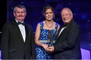 8 November 2014; Caroline Little, Fermanagh, is presented with her TG4 Ladies Football Intermediate Players' Player of the Year Award by Pat Quill, President of the Ladies Gaelic Football Association, in the company of Pól O Gallchóir, left, Ceannsaí, TG4. TG4 Ladies Football All-Star Awards 2014, Citywest Hotel, Saggart, Co. Dublin. Picture credit: Brendan Moran / SPORTSFILE