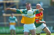 10 June 2007; Scott Brady, Offaly, in action against David Byrne, Carlow. Bank of Ireland Leinster Senior Football Championship, Carlow v Offaly, O'Moore Park, Portlaoise, Co. Laois. Picture credit: David Maher / SPORTSFILE