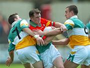 10 June 2007; Marc Carpenter, Carlow, in action against Karol Slattery, left, and Alan McNamee, Offaly. Bank of Ireland Leinster Senior Football Championship, Carlow v Offaly, O'Moore Park, Portlaoise, Co. Laois. Picture credit: David Maher / SPORTSFILE
