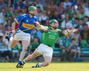 10 June 2007; Andrew O'Shaughnessy, Limerick, in action against Declan Fanning, Tipperary. Guinness Munster Senior Hurling Championship Semi-Final, Limerick v Tipperary, Gaelic Grounds, Limerick. Picture credit: Brendan Moran / SPORTSFILE