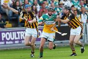 10 June 2007; Derek Molloy, Offaly, in action against Brian Hogan, left, and Noel Hickey, Kilkenny. Guinness Leinster Senior Hurling Championship Semi-Final, Offaly v Kilkenny, O'Moore Park, Portlaoise, Co. Laois. Picture credit: Brian Lawless / SPORTSFILE