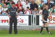 10 June 2007; Kilkenny manager Brian Cody with linesman Dickie Murphy, during the second half of the game. Guinness Leinster Senior Hurling Championship Semi-Final, Offaly v Kilkenny, O'Moore Park, Portlaoise, Co. Laois. Picture credit: David Maher / SPORTSFILE