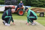 13 June 2007; Peter Gillespie and Trent Johnston, Ireland, inspecting the wicket as they await a decision on the days play. Friends Provident One Day Trophy, Ireland v Glamorgan, Stormont, Belfast, Co. Antrim. Picture credit: Oliver McVeigh / SPORTSFILE