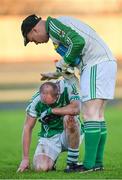 9 November 2014; A dejected Conor Quigley, left, Roslea Shamrocks, is consoled by team-mate Sean Boyle after the game. AIB Ulster GAA Football Senior Club Championship, Quarter-Final, St Eunan's v Roslea Shamrocks, O'Donnell Park, Letterkenny, Co. Donegal. Photo by Sportsfile