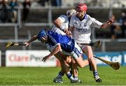 9 November 2014; Padraic Collins, Cratloe, is fouled by Padraic Maher, left, and Billy McCarthy, Thurles Sarsfields. AIB Munster GAA Hurling Senior Club Championship, Semi-Final, Cratloe v Thurles Sarsfields, Cusack Park, Ennis, Co. Clare. Picture credit: Ramsey Cardy / SPORTSFILE