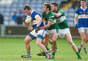 9 November 2014; Ger Brennan, St Vincent's, in action against Gareth Dillon and Adrian Kelly, right, Portlaoise. AIB Leinster GAA Football Senior Club Championship, Quarter-Final, Portlaoise v St Vincent's, O'Moore Park, Portlaoise, Co. Laois. Picture credit: Pat Murphy / SPORTSFILE