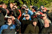 9 November 2014; Spectators shield their eyes from the sun during the game. AIB Munster GAA Hurling Senior Club Championship Semi-Final, Kilmallock v Sarsfields. Fitzgerald Park, Kilmallock, Co. Limerick. Picture credit: Diarmuid Greene / SPORTSFILE