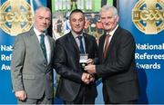 8 November 2014; Referee James McGrath, from Westmeath, is presented with his Senior Hurling Replay 2013 referees' medal by Pat McEnaney, Chairman of National Referee Committee, left, and Frank Burke, Vice-President of the GAA. 2014 National Referees' Awards Banquet, Croke Park, Dublin. Picture credit: Barry Cregg / SPORTSFILE
