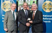 8 November 2014; Referee Cathal McAllister, from Cork, is presented with his U21 Hurling 2014 referees' medal by Pat McEnaney, Chairman of National Referee Committee, left, and Frank Burke, Vice-President of the GAA. 2014 National Referees' Awards Banquet, Croke Park, Dublin. Picture credit: Barry Cregg / SPORTSFILE