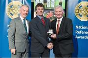 8 November 2014; Referee Tony Carroll, from Offaly, is presented with his Intermediate Hurling 2013 referees' medal by Pat McEnaney, Chairman of National Referee Committee, left, and Frank Burke, Vice-President of the GAA during the 2014 National Referees' Awards Banquet at Croke Park in Dublin. Photo by Barry Cregg/Sportsfile