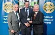 8 November 2014; Referee Sean Hurson, from Tyrone, is presented with his Allianz Football League D3 2014 referees' medal by Pat McEnaney, Chairman of National Referee Committee, left, and Frank Burke, Vice-President of the GAA. 2014 National Referees' Awards Banquet, Croke Park, Dublin. Picture credit: Barry Cregg / SPORTSFILE