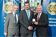 8 November 2014; Referee Declan O'Driscoll, from Limerick, is presented with his Nicky Rackard 2014 referees' medal by Pat McEnaney, Chairman of National Referee Committee, left, and Frank Burke, Vice-President of the GAA. 2014 National Referees' Awards Banquet, Croke Park, Dublin. Picture credit: Barry Cregg / SPORTSFILE