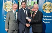 8 November 2014; Referee David Hughes, from Carlow, is presented with his Minor B Hurling 2014 referees' medal by Pat McEnaney, Chairman of National Referee Committee, left, and Frank Burke, Vice-President of the GAA. 2014 National Referees' Awards Banquet, Croke Park, Dublin. Picture credit: Barry Cregg / SPORTSFILE