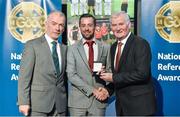 8 November 2014; Referee David Gough, from Meath, is presented with his Allianz Football League D2 2014 referees' medal by Pat McEnaney, Chairman of National Referee Committee, left, and Frank Burke, Vice-President of the GAA. 2014 National Referees' Awards Banquet, Croke Park, Dublin. Picture credit: Barry Cregg / SPORTSFILE
