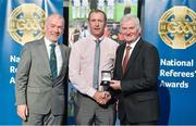 8 November 2014; Referee Anthony Stapleton, from Laois, is presented with his Inter-Provincial Hurling 2013 referees' medal by Pat McEnaney, Chairman of National Referee Committee, left, and Frank Burke, Vice-President of the GAA. 2014 National Referees' Awards Banquet, Croke Park, Dublin. Picture credit: Barry Cregg / SPORTSFILE