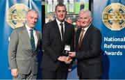 8 November 2014; Referee Alan Kelly, from Galway, is presented with his  Intermediate Hurling 2014 and Allianz Hurling League D1B 2014 referees' medal by Pat McEnaney, Chairman of National Referee Committee, left, and Frank Burke, Vice-President of the GAA. 2014 National Referees' Awards Banquet, Croke Park, Dublin. Picture credit: Barry Cregg / SPORTSFILE