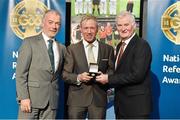 8 November 2014; Referee Ciaran Branagan, from Down, is presented with his Allianz Football League D4 2013 referees' medal by Pat McEnaney, Chairman of National Referee Committee, left, and Frank Burke, Vice-President of the GAA. 2014 National Referees' Awards Banquet, Croke Park, Dublin. Picture credit: Barry Cregg / SPORTSFILE