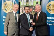 8 November 2014; Referee Derek O'Mahoney, from Tipperary, is presented with his Inter-Provincial Football 2014 referees' medal by Pat McEnaney, Chairman of National Referee Committee, left, and Frank Burke, Vice-President of the GAA. 2014 National Referees' Awards Banquet, Croke Park, Dublin. Picture credit: Barry Cregg / SPORTSFILE